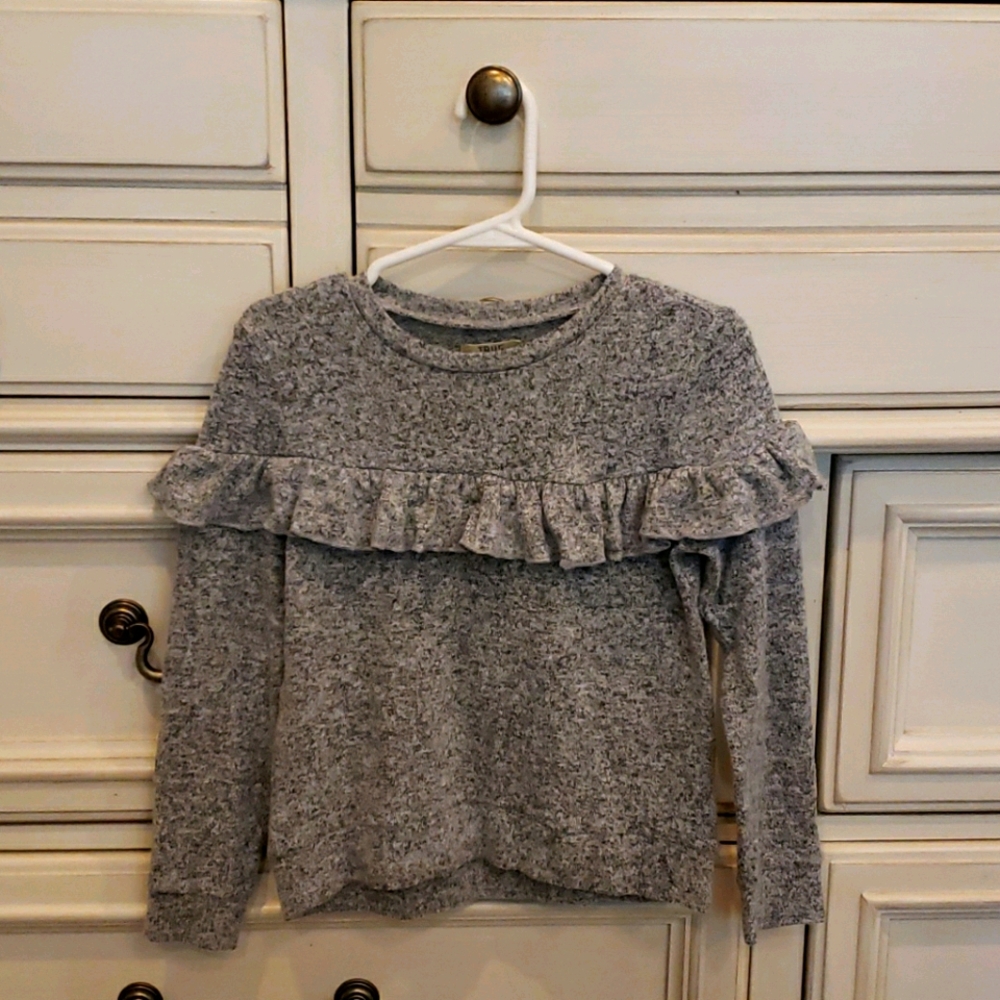 Very cute gray sweater with ruffle. Never worn!
